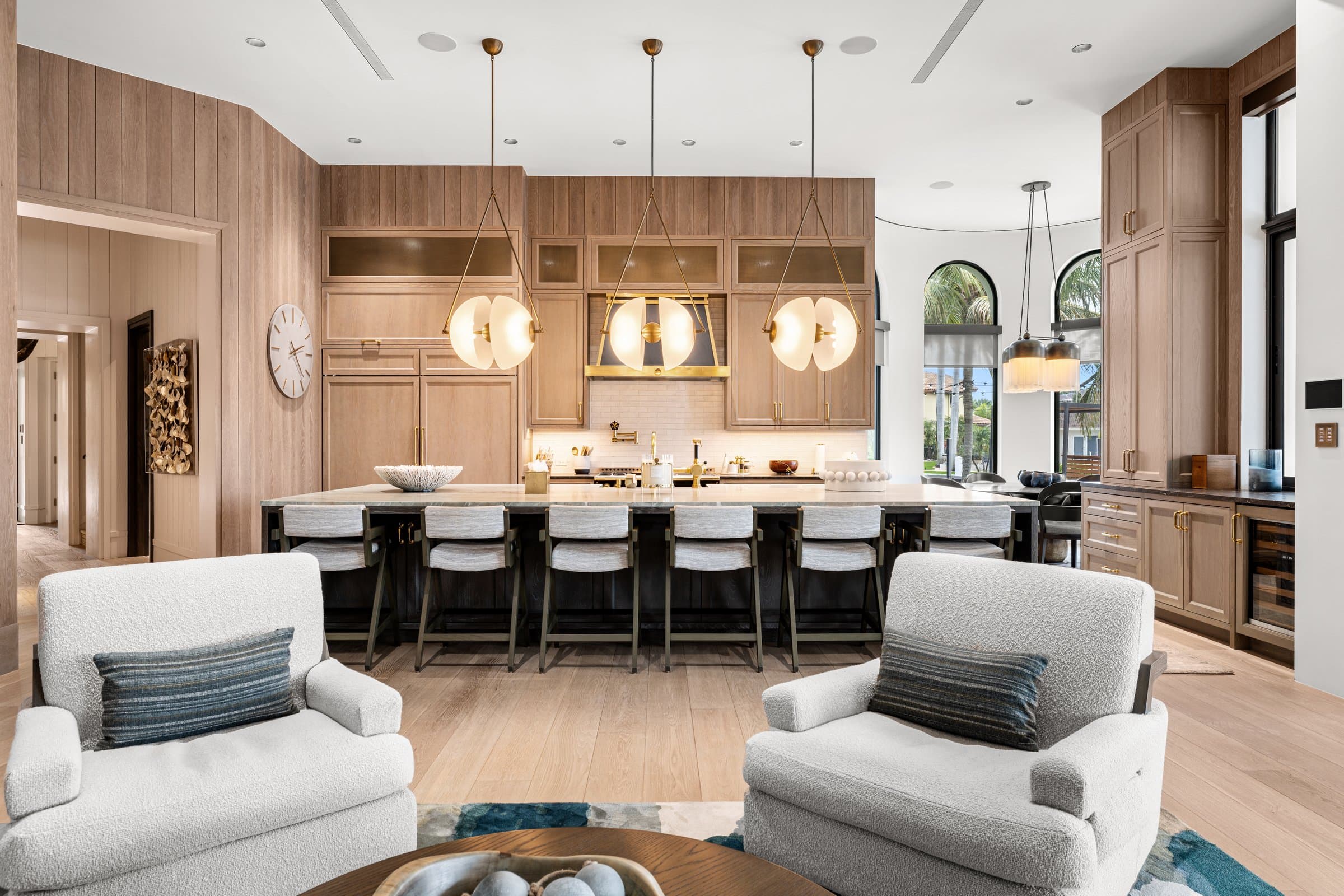 A luxury open kitchen and living area cared for by the Bittencourt Concierge team